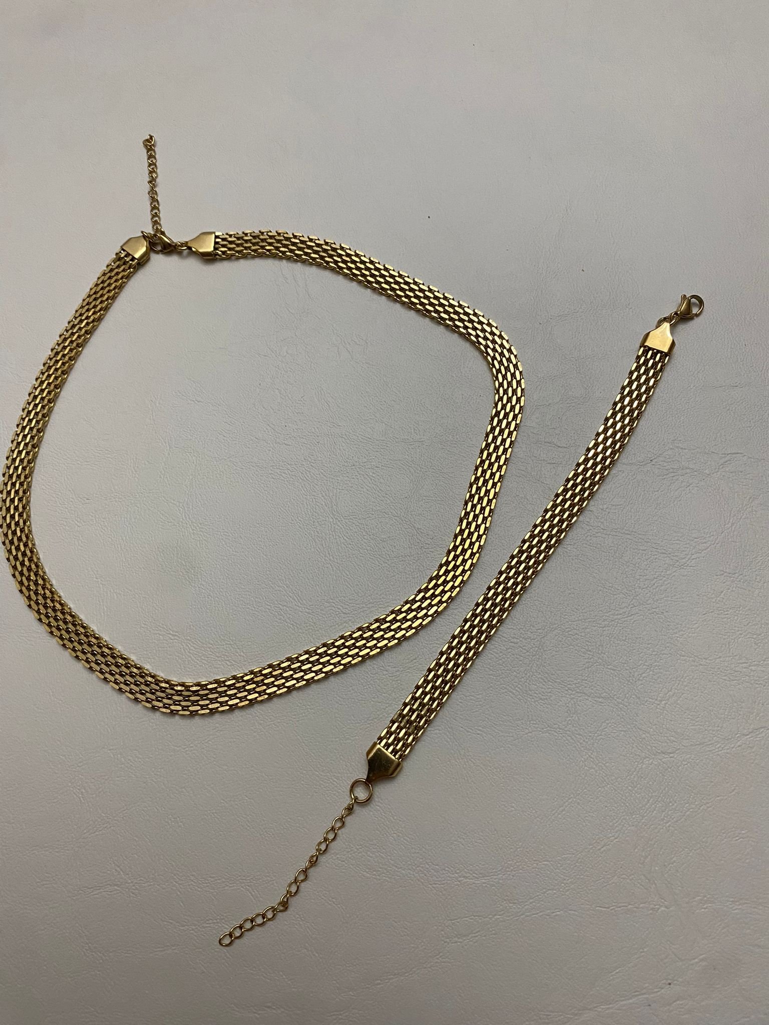 طقم ثقيل (سنسال واسوارة) ستانلس مطلي بالذهب